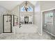Luxurious primary bathroom featuring a soaking tub, glass-enclosed shower, and vaulted ceiling at 2810 Burgundy Dr, Cumming, GA 30041