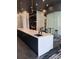 Sleek amenity bar featuring a stylish kitchen area with modern fixtures and adjacent lounge seating at 3324 Peachtree Ne Rd # 1116, Atlanta, GA 30326