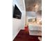 Modern bedroom with hardwood floors, mirrored closet, and a hanging light fixture at 3324 Peachtree Ne Rd # 1116, Atlanta, GA 30326