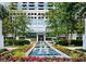 Serene exterior view with a water feature surrounded by colorful flowers and lush greenery at 3324 Peachtree Ne Rd # 1116, Atlanta, GA 30326