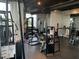 Well-equipped gym with a full range of fitness machines, weights, and mirrored walls for resident workouts at 3324 Peachtree Ne Rd # 1116, Atlanta, GA 30326