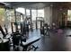 Well-lit gym with a variety of weight training machines and equipment, offering residents a complete workout space at 3324 Peachtree Ne Rd # 1116, Atlanta, GA 30326
