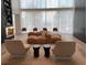 Open-plan living room with modern seating, sheer curtains, and floor-to-ceiling windows at 3324 Peachtree Ne Rd # 1116, Atlanta, GA 30326