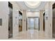 Hallway with three elevators and tiled floors at 3324 Peachtree Ne Rd # 1116, Atlanta, GA 30326