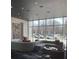 Comfortable lounge area with a sectional sofa, offering a relaxing space with ample natural light at 3324 Peachtree Ne Rd # 1116, Atlanta, GA 30326