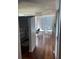 Bright main bedroom with hardwood floors and city views at 3324 Peachtree Ne Rd # 1116, Atlanta, GA 30326