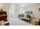 Bright bedroom with white walls and plush carpeting features arched windows and iron bed at 5440 Shady Grove Rd, Cumming, GA 30041