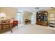 Bonus room with beige walls, neutral carpeting, and vintage furnishings with natural light at 5440 Shady Grove Rd, Cumming, GA 30041