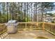 Spacious wooden deck with stainless steel grill perfect for outdoor entertaining and cooking at 6065 Nw Gentlewind Court Nw Ct, Powder Springs, GA 30127