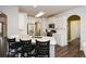 Modern kitchen featuring white cabinetry, stainless steel appliances, and a breakfast bar at 6065 Nw Gentlewind Court Nw Ct, Powder Springs, GA 30127