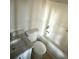 Clean bathroom with a sink that has a granite countertop and a shower and tub combo at 89 Paces Lakes Pt, Dallas, GA 30157