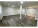 Spacious basement with durable floors, recessed lighting, and neutral color palette at 1570 Childress Sw Dr, Atlanta, GA 30311