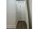 Additional storage room with wood laminate flooring; can also be used as a pantry at 1570 Childress Sw Dr, Atlanta, GA 30311