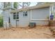 A view of the back exterior with a door, window, and steps at 3436 Misty Valley Rd, Decatur, GA 30032