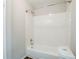 Bathroom featuring a clean white tiled shower and tub, along with modern fixtures at 3436 Misty Valley Rd, Decatur, GA 30032