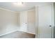 Clean bedroom featuring neutral walls, plush carpeting, two closets, and white trim at 3436 Misty Valley Rd, Decatur, GA 30032
