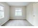 Cozy bedroom featuring neutral walls, plush carpeting, and a closet for storage at 3436 Misty Valley Rd, Decatur, GA 30032