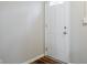 Entryway featuring solid wood door with decorative window and luxury vinyl plank flooring at 3436 Misty Valley Rd, Decatur, GA 30032