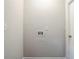 Laundry room area featuring gray walls, tile flooring, and hookups for a washing machine and dryer at 3436 Misty Valley Rd, Decatur, GA 30032
