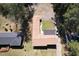 Aerial view of a brown roof house, showcasing its unique L-shape and outdoor space at 5159 Covington Hwy, Decatur, GA 30035