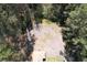 An aerial view of a lot surrounded by trees ready for building a home at 5159 Covington Hwy, Decatur, GA 30035
