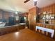 Cozy kitchen with wood paneling, granite countertops, stainless steel appliances and room for dining at 5169 Covington Hwy, Decatur, GA 30035