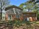 This home boasts a well-maintained exterior with a spacious backyard, ideal for outdoor activities and entertaining guests at 5470 Chanterella Sw Ct, Lilburn, GA 30047