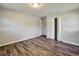 Bedroom has hardwood floors and closet at 5470 Chanterella Sw Ct, Lilburn, GA 30047