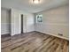 Bedroom featuring hardwood floors and closet at 5470 Chanterella Sw Ct, Lilburn, GA 30047