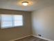 Bedroom featuring a window and hardwood floors at 5470 Chanterella Sw Ct, Lilburn, GA 30047