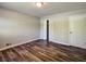 Bedroom has hardwood floors and closet at 5470 Chanterella Sw Ct, Lilburn, GA 30047