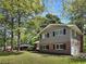 This home boasts a well-maintained exterior with a spacious backyard, ideal for outdoor activities and entertaining guests at 5470 Chanterella Sw Ct, Lilburn, GA 30047