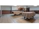 Open basement featuring tile flooring, paneled half-walls, and potential entertainment space at 10 Flowers Dr, Covington, GA 30014