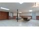 Basement featuring two pool tables and a tile floor at 10 Flowers Dr, Covington, GA 30014
