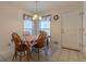 Sunny dining area featuring a table and chairs and easy access to the kitchen at 10 Flowers Dr, Covington, GA 30014