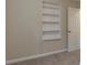 Bedroom featuring a wall-mounted bookshelf at 1248 W Ridge Ave, Stone Mountain, GA 30083