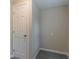 A small closet with a door at 1248 W Ridge Ave, Stone Mountain, GA 30083