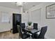 Cozy dining area with a modern table, chairs, and nearby appliances for convenient meals at 2344 Johnson Ferry Ne Rd, Atlanta, GA 30341