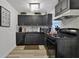 Charming kitchen features dark cabinetry, updated appliances, and stylish decor at 2344 Johnson Ferry Ne Rd, Atlanta, GA 30341