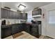 Modern kitchen featuring sleek cabinetry, updated appliances, and ample counter space at 2344 Johnson Ferry Ne Rd, Atlanta, GA 30341