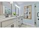 Beautiful bathroom with double vanity, quartz countertop, and tiled shower at 2535 Judson Ave, East Point, GA 30344