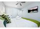 Simple bedroom with mounted television and ensuite bathroom access at 2535 Judson Ave, East Point, GA 30344