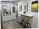 Hallway with art and an eating space with bar stools, adding a touch of style and functionality at 2535 Judson Ave, East Point, GA 30344
