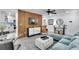 Cozy living room featuring modern decor, stylish furniture, and sleek wooden accent wall at 2535 Judson Ave, East Point, GA 30344