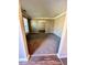 Spacious living room with neutral paint, plush carpeting, and an arched entryway at 4244 Old House Dr, Conley, GA 30288