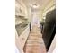 Functional kitchen with sleek, stainless steel appliances and bright white cabinets at 5050 Martins Crossing Rd, Stone Mountain, GA 30088
