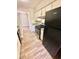 This kitchen boasts stainless steel appliances, and plenty of cabinets at 5050 Martins Crossing Rd, Stone Mountain, GA 30088