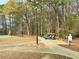 Tennis courts and golf carts, offering recreational amenities and convenient transportation at 813 Ridgefield Dr, Peachtree City, GA 30269