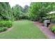 Beautiful backyard featuring lush greenery and outdoor grill at 326 Roswell Se St # 706, Marietta, GA 30060