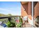 Private balcony with outdoor seating, potted plants, and city view, perfect for relaxing at 326 Roswell Se St # 706, Marietta, GA 30060